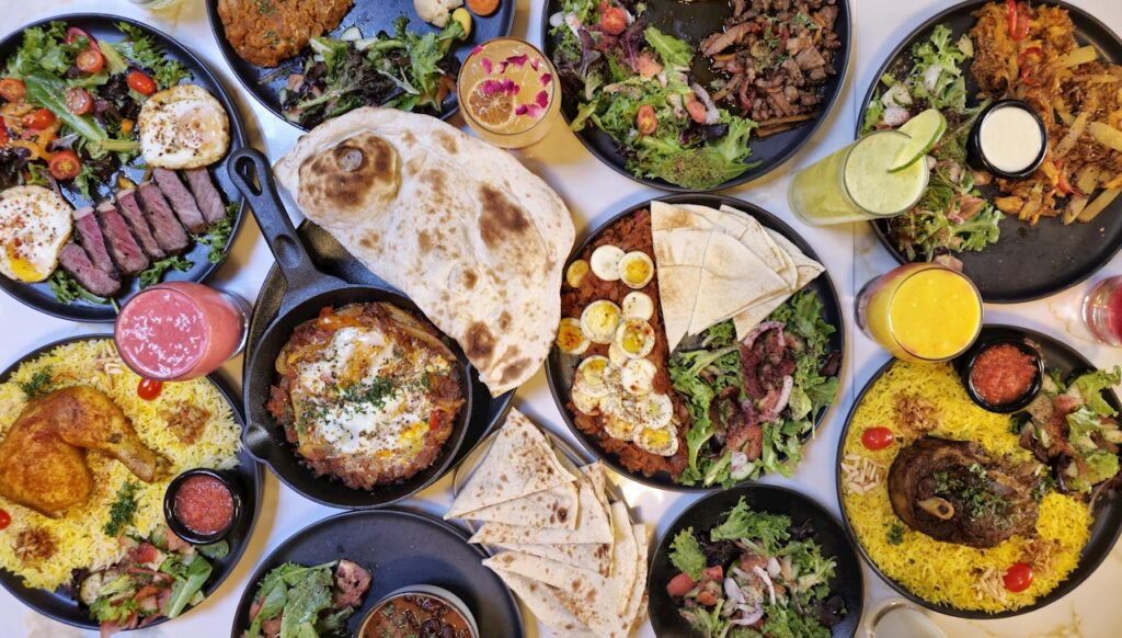 A Table Full of Multiple Items of Arabic and Iranian Cuisine royalarabianrestaurant.com